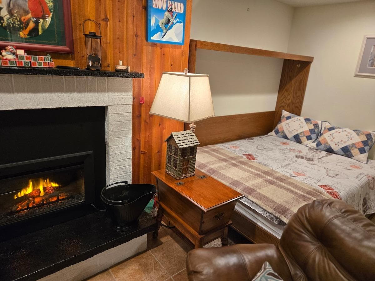 Full size REAL Queen mattress Murphy Bed tucked in the corner of the living room
